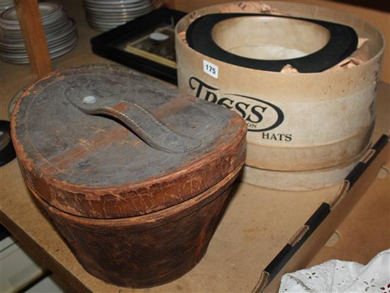 2 leather cased top hats